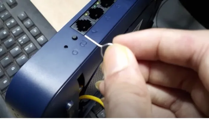 broken paperclip stuck in router