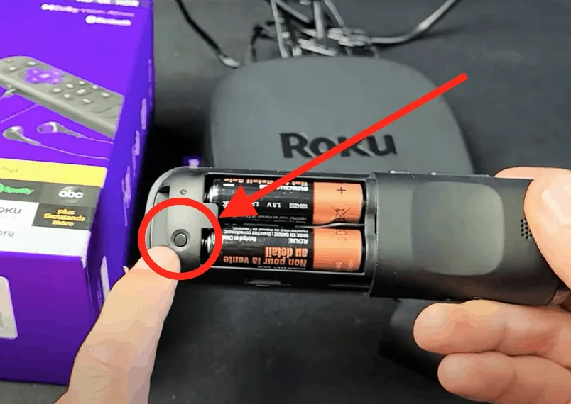 pressing roku remote pairing button